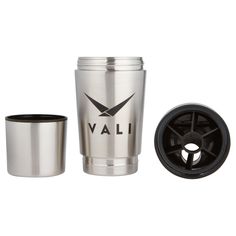 the stainless steel tumbler is next to a black plastic cup with an emblem on it