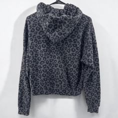 This Leopard Print Cozy Hoodie features a subtle animal print pattern that adds a charming touch to any outfit. Crafted with a comfortable and cozy material, it provides warmth and a comfortable fit, making it a versatile addition to your wardrobe. Perfect for layering, this hoodie combines casual style with a bit of edge, ideal for those looking to elevate their everyday look. Specifications: Comfortable Fabric: Made from soft, high-quality material designed for all-day comfort Stylish Pattern: Cheetah Hoodie, Leopard Print Hoodie, Leopard Hoodie, Comfy Blouse, Animal Print Pattern, Warm Pants, Sleeveless Short Dress, Animal Prints Pattern, Cozy Hoodie