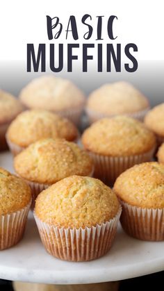 muffins on a white plate with the words basic muffin recipe above them