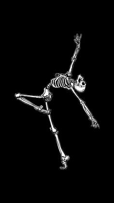 a skeleton is flying through the air with his arms outstretched and legs spread out,