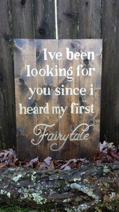 a wooden sign that says i've been looking for you since i heard my first fairy tale