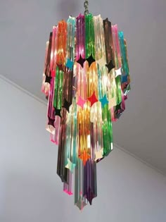 a multicolored chandelier hanging from the ceiling