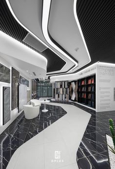 the interior of a modern library with black and white marble flooring, bookshelves and chairs