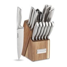 a knife block with knives in it on a white background