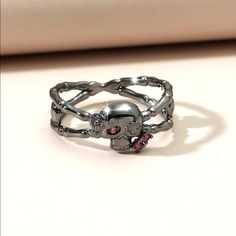 White Gold Plated Fashion Ring, Skull On Front Has Pink Zircon's For Eyes, Smaller Solid Skull On Each Side. Size 7, Very Cute! Map Making, Multi Gemstone Ring, London Blue Topaz Ring, Pave Diamond Ring, Fantasy Map, Cuff Rings, For Eyes, 7 Rings, Zircon Ring