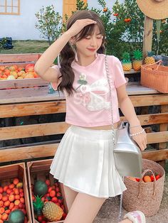 This cute and charming t-shirt features a lovely bunny design, making it a perfect addition to any kawaii or lolita wardrobe. The bowknot and flower detail add an extra touch of sweetness.  Please note that this product includes only one T-shirt.  Garment Size   	 		 			Size 			S 			M 			L 		 		 			Full Length 			37 			38.5 			40 		 		 			Bust 			77 			81 			85 		 		 			Shoulders 			33.5 			34.5 			35.5 		 		 			Sleeve Length 			15.5 			16 			16.5 		 		 			Hem Circumference 			70 			74 			78 Spring Cotton T-shirt With Bow, Casual T-shirt With Cute Design For Spring, Cute Bow T-shirt For Spring, Summer T-shirt With Bow And Short Sleeves, Summer Bow T-shirt With Short Sleeves, Summer Short Sleeve T-shirt With Bow, Summer Bow Detail Short Sleeve T-shirt, Cute Summer Top With Bunny Design, Cute Summer Tops With Bunny Design