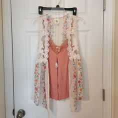 Size Small Rose Colored Cami W/Lace Beige Cover Up With Flowers And Lace Gold Colored Necklace With Rose Colored Pendant Has Been Washed, But Never Worn Make An Offer Bohemian Floral Print Spring Vest, Bohemian V-neck Vest For Spring, Bohemian Style Summer Vest For Day Out, Bohemian Sleeveless Vest For Spring, White Spring Vest For Vacation, Chic Tank Top For Spring Festival, Bohemian Floral Print Summer Vest, White Bohemian Tank Top With Floral Print, Spring Festival V-neck Tank Top