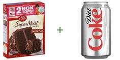 two boxes of cake and a can of coke with the same product on it,