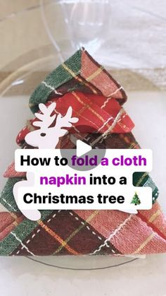 how to fold a cloth napkin into a christmas tree ornament with text overlay