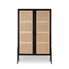 a black and brown cabinet with wicker panels on the doors, against a white background