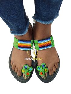 African Sandals. Made using high quality leather And beads. Green Leather Beach Sandals, Green Casual T-strap Sandals For Beach, Bohemian Green Sandals For Spring, Green Leather Toe Post Sandals, Green Bohemian Leather Sandals, Green Leather Bohemian Sandals, Green Bohemian Sandals With Round Toe, Green Bohemian Round Toe Sandals, Green Bohemian Open Toe Sandals