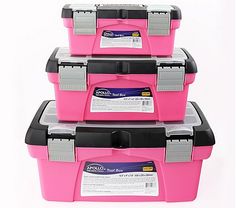 three pink and black storage containers stacked on top of each other with labels on them