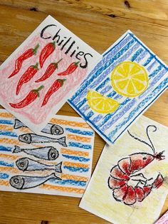 four children's handmade cards with pictures of fish, lemons and peppers