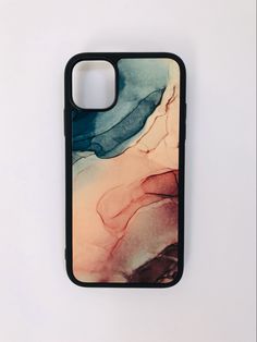 a phone case with an abstract painting on the front and back cover, sitting on a white surface