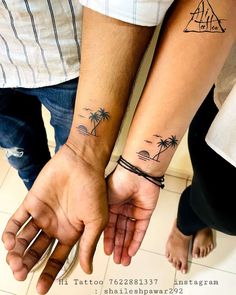 two people holding hands with palm trees on their wrist tattoo designs for men and women