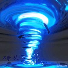 an abstract photo with blue lights and water