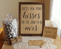 there is a sign on the table that says, cross how many kisses for the son - in - law mrs