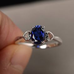 This is a gorgeous handmade creation. Its beauty is its simplicity & Elegance. The 6*8mm oval shape faceted lab sapphire is crafted in solid sterling silver and with rhodium plated. All item is sent in a beautiful gift box If you have any idea of design your ring,pls contact me directly. You can realize more lovely stuff clicking the link https://www.etsy.com/shop/knightjewelry?refshopsection_shophome_leftnav Please leave the correct address and you phone number for delivering successfully. Oval Sapphire Promise Ring, Oval Solitaire Sapphire Ring With Cubic Zirconia, Elegant Sapphire Birthstone Ring In Oval Shape, Oval Lab-created Sapphire Ring, Oval Sapphire Solitaire Birthstone Ring, Oval Sapphire Birthstone Ring, Oval Cubic Zirconia Sapphire Ring Gift, Silver Oval Sapphire Birthstone Ring, Sapphire Crystal Oval Ring For Gift