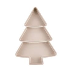 a white christmas tree shaped cake pan on a white background