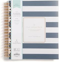 a blue and white striped planner book