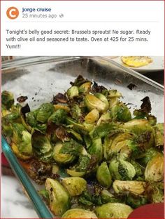 a pan filled with brussel sprouts on top of a table