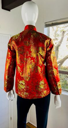 "Mannequin 4 Vintage Chinese red & gold silk rayon brocade jacket, 4-6. Good condition. Never worn. Size; 4/ 6 B; 36\" SL; 22\" L; 27\"" Vintage Red Party Blazer, Fitted Red Blazer For Festive Occasions, Traditional Red Costume Outerwear, Fall Brocade Long Sleeve Outerwear, Fall Long Sleeve Brocade Outerwear, Long Sleeve Brocade Outerwear For Fall, Red Long Sleeve Blazer For Festive Occasions, Red Fitted Silk Outerwear, Red Silk Fitted Outerwear