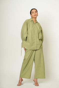 Introducing our Sage Green Summer Gathered Co-ord set, where comfort meets style effortlessly. Crafted from organic cotton, this set features an oversized shirt and pants combination, offering a smart yet comfy casual outfit perfect for the season. The breathable fabric ensures you stay cool and relaxed whether you're lounging at home or exploring new destinations. Customizable in plus sizes, it's tailored to flatter all body types, making it the ideal travel leisurewear for your summer adventur Co-ord Sets, Oversized Shirt And Pants, Cotton Co Ord Sets, Plus Size Travel, Co Ords Outfits, Inexpensive Clothes, Comfy Casual Outfits, Summer Gathering, Poplin Dress