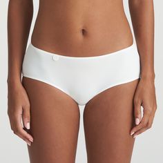 These shorts have been glued, not stitched, to ensure a fully seamless fit. The ultra-light fabric ensures a wonderfully comfortable fit with no visible lines. A subtle softer take on white, Natural looks great against any skin type. Elegant White Bottoms With Soft Touch, White Smoothing Bottoms, Elegant Short Length Bottoms With Soft Touch, White Elastane Bottoms With Short Legs, White Smoothing Elastane Bottoms, Modern White Short Bottoms, White Elastane Short Leg Bottoms, White Seamless Short Leg Bottoms, Compressive Seamless Shorts With Short Inseam