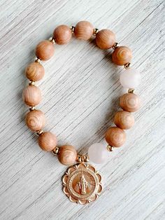 Discover the Rose Quartz Rosary Bracelet from our Catholic Jewelry collection as well as more stunning Catholic Bracelets from House of Joppa. Shop today! Catholic Rosary Bracelet, Pray The Rosary, Catholic Bracelet, Bracelet Card, Praying The Rosary, Catholic Jewelry, Rosary Bracelet, The Rosary, Rose Quartz Beads