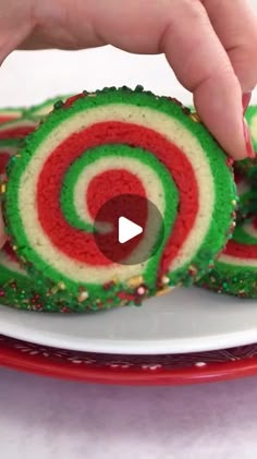 Elizabeth (SugarHero.com) • Dessert Recipes 🧁🍩🍰🍪 on Instagram: "Festive Pinwheel Sugar Cookies are beautiful AND delicious! 💚❤️ Comment “Pinwheel” and I”ll DM you a link to the recipe! 🌀 These are made with a simple sugar cookie dough, rolled into a beautiful red, white, and green spiral design, and rolled in sprinkles. ✨ WHAT YOU’LL NEED: • 12.75 oz all-purpose flour, (3 cups) • 1 tsp baking powder • ½ tsp salt • 8 oz unsalted butter, (1 cup), at room temperature • 8.75 oz granulated sugar, (1.25 cups) • 1 large egg, at room temperature • 2 tsp vanilla extract • Red and green food coloring, I used Americolor gel colors • 6.75 oz sprinkles, (1 cup) 💓💚💓Get the instructions on SugarHero.com - search "Christmas Pinwheel Cookies!" or go here 👉 https://www.sugarhero.com/christmas-pinw Spiral Christmas Cookies, Red And Green Pinwheel Cookies, Red And Green Swirl Cookies, Christmas Spiral Cookies, Swirled Christmas Cookies, Spiral Cookies Christmas, Pinwheel Christmas Cookies, Red And Green Food, Pinwheel Cookies Christmas