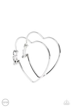 A glistening silver bar delicately curves into an oversized heart frame, resulting in a heart-stopping shimmer. Earring attaches to a standard clip-on fitting.

Sold as one pair of clip-on earrings. Paparazzi Accessories Jewelry, Bracelet Display, Gold Clips, Heart Frame, Silver Bar, Earring Display, Paparazzi Accessories, Silver Bars, Affordable Jewelry