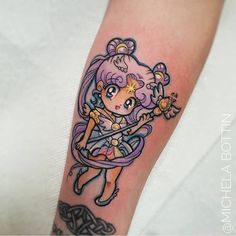 a girl with a bow tattoo on her arm