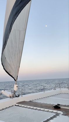 the back end of a sailboat with it's sails down