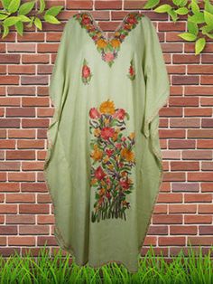 Womens Maxi Kaftan Dresses, Green Embroidered Dress L-2XL Kaftans make great gifts and are super cute for a destination beach wedding or as a boho dress for the rehearsal dinner.These feminine, flowy, beautiful, long, colorful maxi dresses are wonderful coverups or day dresses. One size that fits all, caftans are great as hostess dresses, resort wear. Kashmiri Crewel traditional hand embroideredCotton Fabric Relaxed fit, multiple uses.Measurement : Length : 54" chest : 54 inch, One size fits L/X Casual Green Dress For Festive Occasions, Green Dress With Resham Embroidery For Summer, Green Resham Embroidered Kaftan For Spring, Green Chikankari Embroidery Kaftan For Spring, Casual Embroidered Festive Dresses, Green Floral Embroidered Maxi Kaftan, Casual Summer Kaftan With Floral Embroidery, Green Embroidered Cotton Kaftan, Embroidered Green Cotton Kaftan