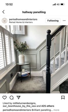 the stairs in this house have been painted gray and white with black trimmings