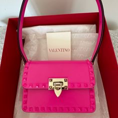 New With Tags And Original Box Valentino Garavani Rockstud23 Small Shoulder Bag In Smooth Calfskin In Signature Pink Pp Color. Never Worn, Never Used. All Authenticity Cards Included. Can Provide Pic Of Original Receipt (Purchased At Valentino Boutique In Soho Nyc) - I Originally Paid $2,590 + Tax In May 2023. Tone-On-Tone Enameled Stud Trim. The Bag Can Be Worn On The Shoulder/Cross-Body Thanks To The Adjustable Shoulder Strap. - Platinum-Finish Hardware - Iconic Hook Closure - Leather Lining. Valentino Handbags Pink, Valentino Pink Bags, Valentino Pink Purse, Valentino Garavani Bag, Soho Nyc, Valentino Bags, Small Shoulder Bag, Small Bag, Pink Bag