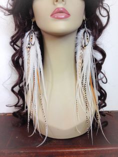 "Fabulous extra long feather earrings with all natural colors of cream, white, ginger, and grizzly. The tops are securely wire wrapped and finished with accent feathers that draw the eye in. You will feel like a beautiful snow princess and be the bell of the ball. Dangle about 11-12 inches long and are very light and easy to wear. Sometimes I get them longer depending on my stock. The last photo is a appreciation photo given to me by one of my customers. Shipped in a gift box for safe travel and Adjustable White Feather Jewelry, Natural Ginger, Beautiful Snow, Snow Princess, White Feather, Feather Jewelry, White Feathers, Long Winter, Safe Travel