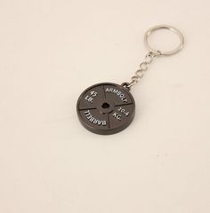 a keychain that has a clock on it