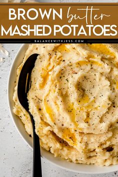 mashed potatoes in a white bowl with a black spoon and text overlay that reads brown butter mashed potatoes