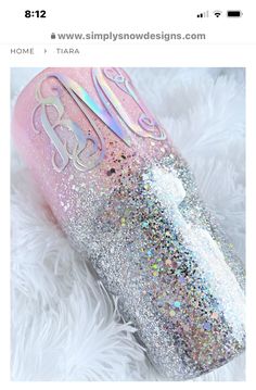 a pink and silver glitter bottle with the word's name in white letters on it