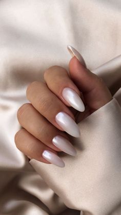 hailey bieber inspired nails 🐚 in 2022 Velvet nails, Ivory nails White Chrome Nails Designs Almond, Haily Biber White Nails, Milky White Nails Shimmer, White Oval Nails With Designs, Peal White Nails, Hailey Bieber Milky White Nails, Velvet Nails White, Shimmery White Almond Nails, Milky White Pearl Chrome Nails