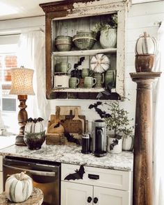 a kitchen counter topped with lots of dishes