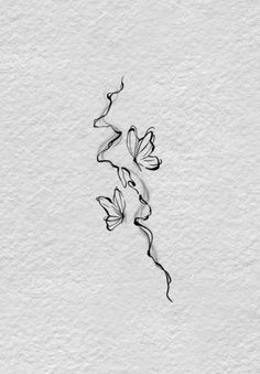 two butterflies flying in the air on top of a white paper background with black ink