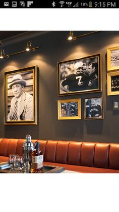 an image of a restaurant setting with pictures on the wall