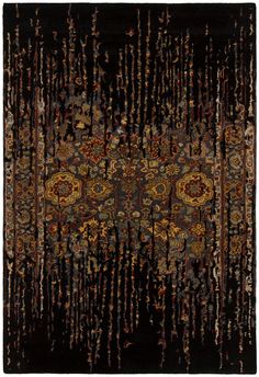 an area rug with many different colors and patterns