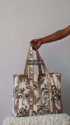 "One~of~A~Kind Vintage Kantha Jhola Bag made by Indian Artisans, this kantha hopping bag is totally unique and multi purpose. Use this for your grocery or as a travel bag. Perfect to suit all. Size in Inch -  Height-19\" inch Width - 25\" inch Handle-  11\" inch Size In CM :- 40x40x13 cm Handle height - 35 cm Material : 100% Cotton Pattern : Quilted Style : Ethnic Product Work: Printed & quilted Stitched Usage : Cosmetic, Make-up, Travel, Toiletries, Medicine, Accessories, Shopping and much more. Perfect for Beach Visits/ Quick Grocery runs/ Carrying Kids items/ Artist Paint book and Paints /Extra Bag Washable on Cold / Delicate wash/ Make a good Sustainable Gift. Wash Care Instructions :- Dry Clean Only Thanks For Visiting Our Shop." Animal Print Tote Bags, Velvet Quilt, Quilted Tote Bags, Hippie Bags, Quilted Totes, Weekend Bag, Kids Items, Sustainable Gifts, Vintage Kantha