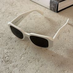 White Prada Sunglasses White Prada Sunglasses, Wishlist Ideas, Prada Accessories, Prada Sunglasses, Christmas Wishlist, Colored Sunglasses, Sunglasses Accessories, Prada, Color White