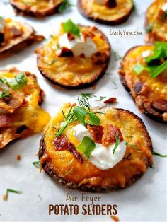 baked potato slices topped with sour cream and bacon are ready to be served on the grill