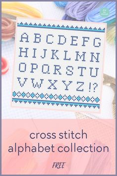 the cross stitch alphabet collection is shown with scissors and yarns in front of it