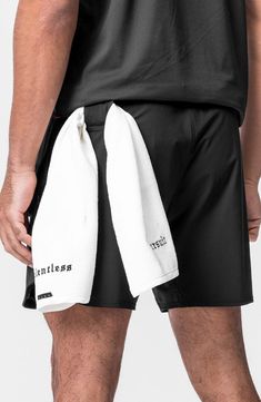 These water-resistant shorts are lightweight, linerless and made of four-way-stretch fabric for effortless movement. A technical front overlay panel partially conceals two vertical zip pockets to securely store your essentials while a handy utility loop holds a towel or shirt. 7" inseam; 22" leg opening; 13 front rise; 15" back rise (size Medium) Drawstring waist Utility loop holds shirt or towel Water resistant 76% nylon; 24% spandex Machine wash, line dry Imported Functional 4-way Stretch Shorts With Drawstring, Black 4-way Stretch Athletic Shorts For Outdoor Activities, Black 4-way Stretch Athletic Shorts For Outdoor, Black Athletic Shorts With 4-way Stretch For Outdoor, Black 4-way Stretch Technical Bottoms, Black 4-way Stretch Technical Fabric Bottoms, Black Technical Fabric Gym Bottoms, Black Athleisure Bottoms In Technical Fabric, Black Sportswear Bottoms In Technical Fabric